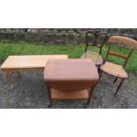 Two cane seated chairs, together with a tea trolley and a rectangular coffee table