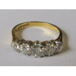 A five stone diamond ring, stamped '18ct' and 'Plat', the graduated old brilliant cuts totalling
