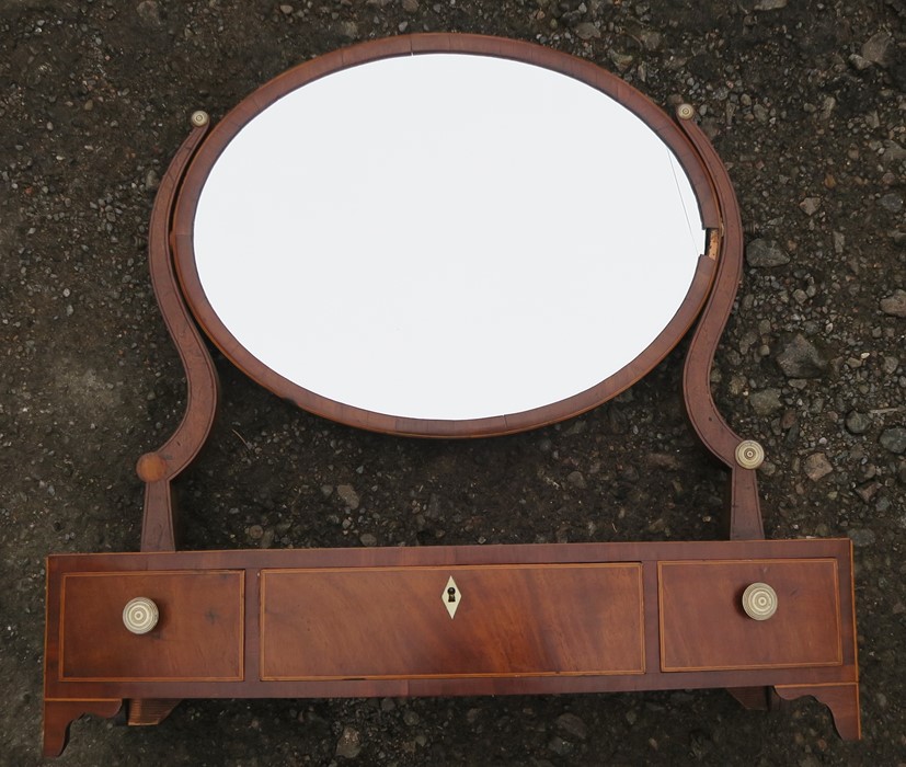 A Victorian oval swing frame toilet mirror, having three drawers to the base, width 20.75ins x