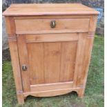 A pine cabinet, fitted with a drawer over a cupboard, 23ins x 15ins, height 30ins