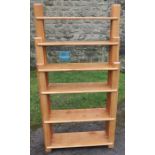 A part graduated set of six shelves, possibly Cotswold School by Fred Foster, width 30ins x