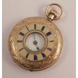 A lady's chased, engraved and enamelled half hunter circular fob watch, with enamel dial, the back