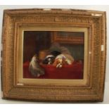 A 19th century rectangular porcelain plaque, decorated with Cavalier King Charles spaniels on a