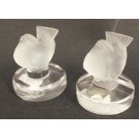 Two Lalique models of fledgling birds, raised on circular bases, one a menu holder, diameter 2ins