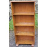 A four shelf set of oak book shelves, width 22.5ins x depth 8ins x height 48ins