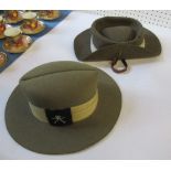 Two felt bush hats, with metal badges, impressed 1943 to the interior