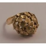 A yellow gold multi leaf design ring, the six rows of leaves set at a slight angle on a twist,