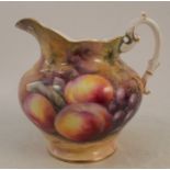An unmarked Royal Worcester cream jug, decorated with hand painted fruit by Tom Lockyer, height 4.