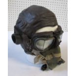 A WW2 style composite C type leather flying helmet, with goggles and mask