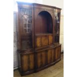 A modern mahogany veneered side unit, with shelves and cupboards