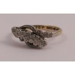 A five stone diamond ring, set with single cuts, stamped '18ct', 2.7g gross