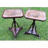 A pair of low rectangular tripod tables, decorated with an embroidered basket of fruit to the