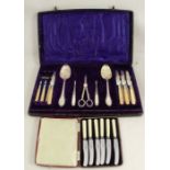 A cased set of silver plated cutlery, comprising a pair of berry serving spoons, a pair of picks,