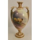 A Royal Worcester porcelain vase, decorated with sheep in a mountainous landscape by Harry Davis,
