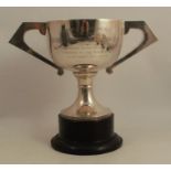 A silver two handled trophy cup, with presentation inscription for Albrighton, Woodland &