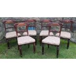 A set of six 19th century rosewood bar back dining chairs, with carved decoration and stuff over