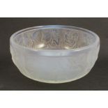 A Sabino opalescent glass bowl, embossed with Classical figures, animals and birds, diameter 9.5ins,