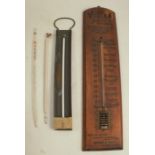 An advertising thermometer, The Vulcan Boiler & General Insurance Co. Ltd Manchester, on a pine