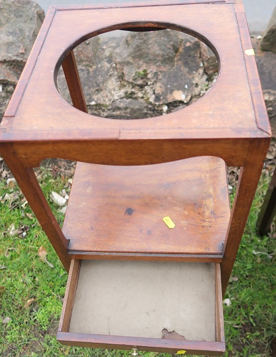 A 19th century mahogany wash stand, of square form, with well to the top, over a drawer with plant - Image 2 of 3