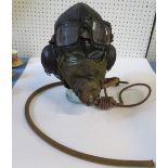 A WW2 style composite B type leather flying helmet, with goggles and mask.  Parts of this helmet