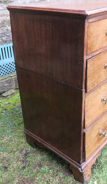 An 18th century oak chest, of two short drawers over three long drawers, raised on bracket feet, ( - Image 2 of 2