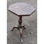 An octagonal topped occasional table, raised on a tripod base, diameter 16.5ins x height 27ins