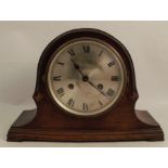 An oak cased mantel clock, with silver dial, the striking movement stamped D.R.G.M, height 9ins