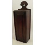 A 19th century mahogany candle box, of rectangular form with sliding lid, height 18ins