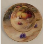 A Royal Worcester miniature teacup and saucer, decorated with hand painted fruit by Ricketts,