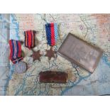 Flight Officer D W McBride, RAF 1939 Burma Star, 1939-45 War Medal together with escape map, peace