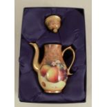 A Royal Worcester miniature coffee pot, decorated with fruit to a mossy background by Bowman,