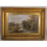 A 19th century school, oil on canvas, river scene with church in the background, signed , 16ins x