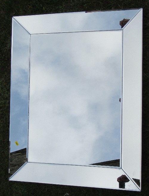 A modern mirror, with mirrored frame, 35.5ins x 27.5ins including frame