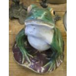 A model of a frog on a lily pad