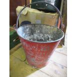 A metal fire bucket