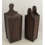 Two 19th century oak candle boxes, with slide lids, height 17ins and 16ins