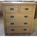 A modern oak chest, of two short over three long drawers, 39ins x 16.5ins x height 43ins