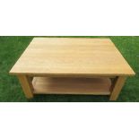 A modern pine two tier coffee table, 48ins x 36ins x height 19ins