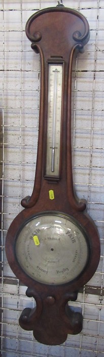 A 19th century walnut banjo barometer, having mercury filled thermometer, the silvered dial engraved