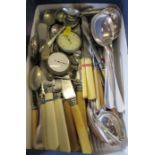 A collection of flatware and two stop watches