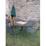 A set of green metal garden furniture, together with parasol, and garden tools