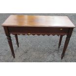 A 19th century mahogany side table, fitted with an end drawer, having a shaped frieze and raised