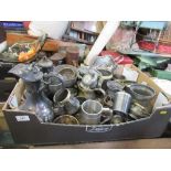 A box of assorted pewter