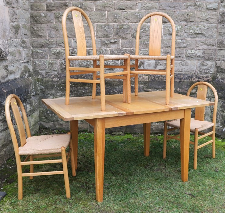 A 20th century drawer leaf dining table, together with a set of four dining chairs