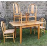 A 20th century drawer leaf dining table, together with a set of four dining chairs