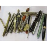 A collection of propelling pens, pencils, fountain pens, etc.