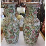 A pair of oriental vases, height 10ins
