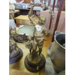 A pair of spelter figures