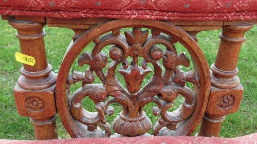 A Victorian show wood settee, with upholstered shaped top rail, having carved and turned supports to - Image 2 of 5
