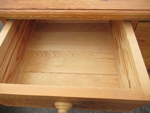 A pine chest, of two short drawers over four long drawers, raised on a plinth base, height 45.5ins x - Image 3 of 4